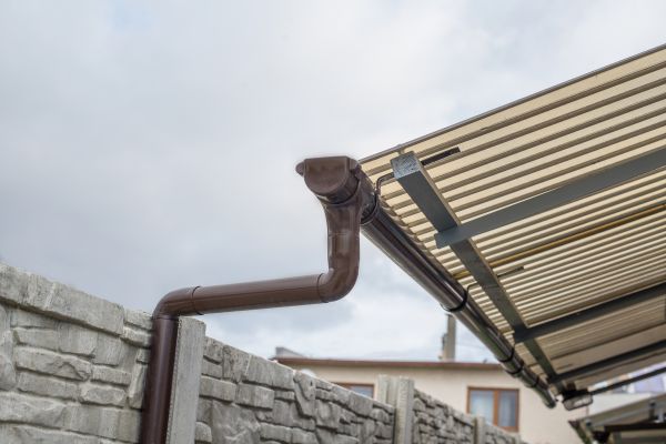 Plastic Downspout Installation in Jasper